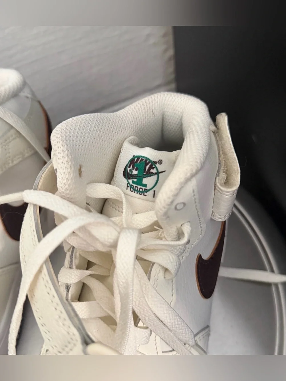 Nike Kids Mid-Top Sneakers in Off-White with Dark Brown Swoosh